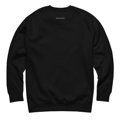 Back of the black HOPE sweatshirt with the @hopeinhindy label printed on the outside label